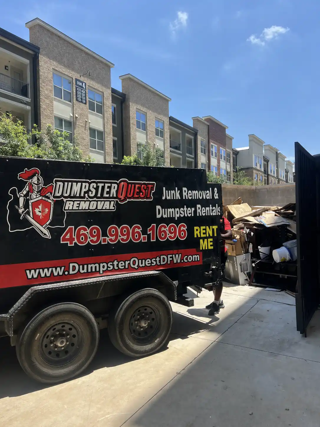commercial dumpster at business site during loading of commercial waste